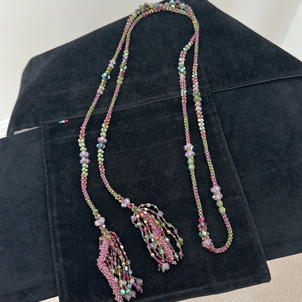 Multi beaded lariat necklace of greens and purples 63” long